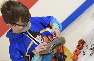  SSAE student reconstructs a skate March 10 at Skate City.
